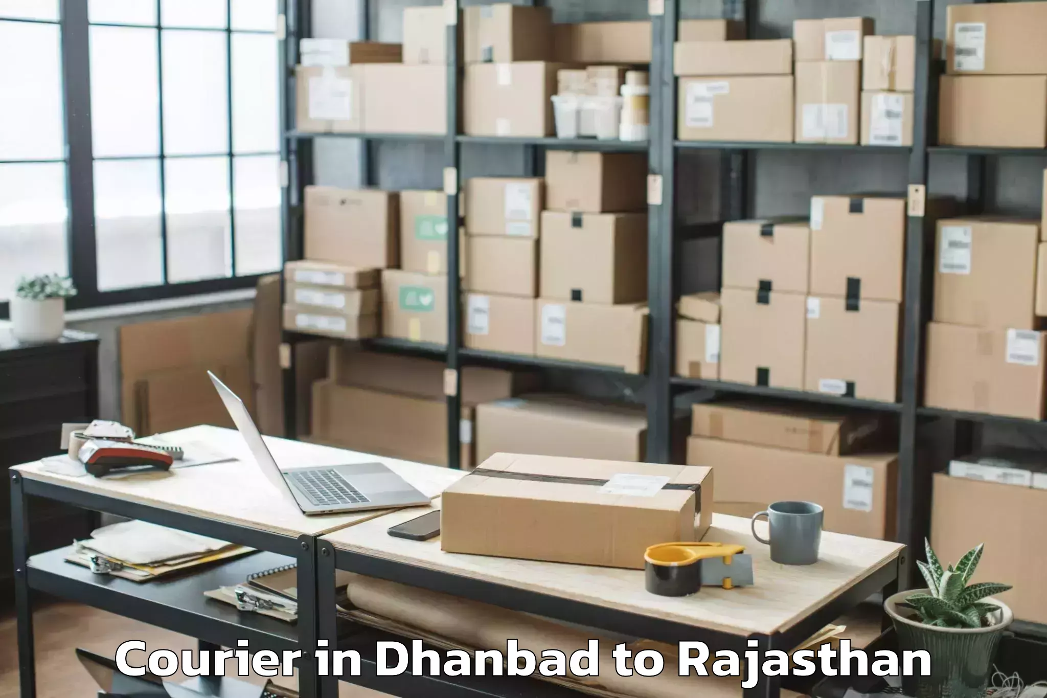 Dhanbad to Lakheri Courier Booking